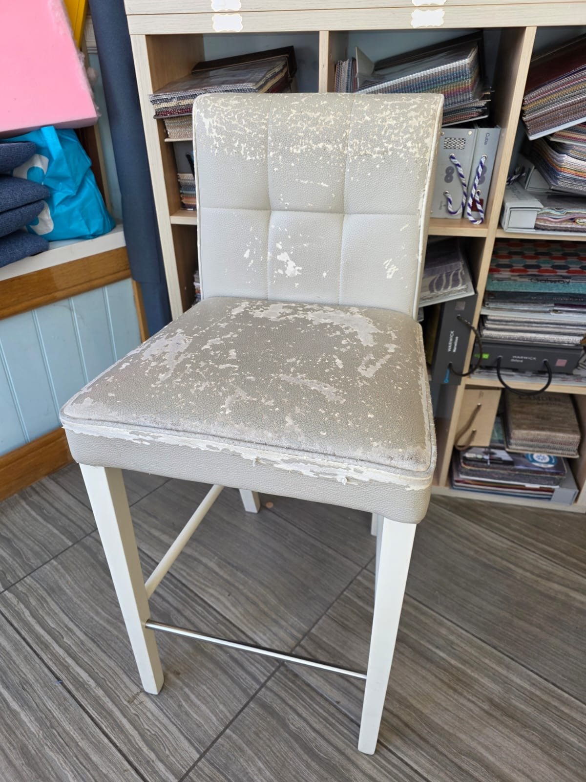 Cream dining chair with light patterned seat and back