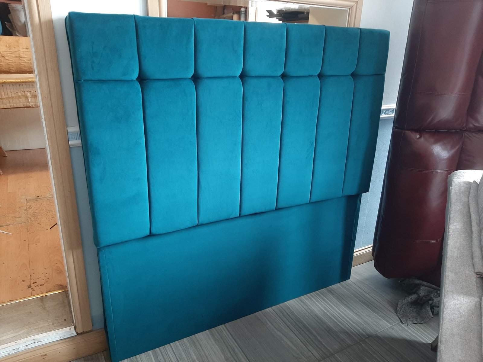 Turquoise-blue panelled headboard